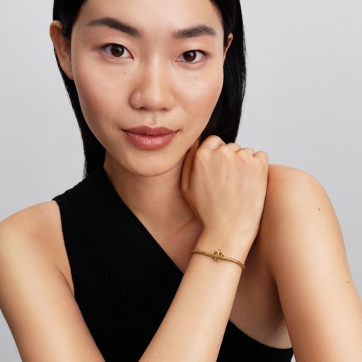 Förgylld berlock med hänglås