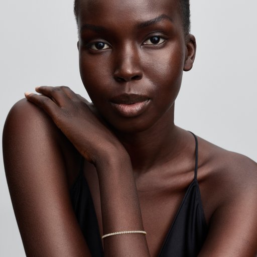 Förgyllt tennisarmband 18 cm