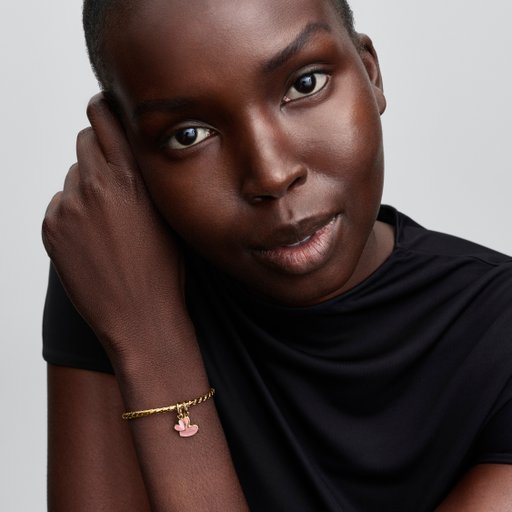 Förgylld berlock med hjärtan