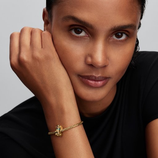 Förgylld berlock med Disneys Lady