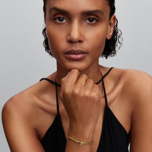 Förgylld berlock med en tulpan