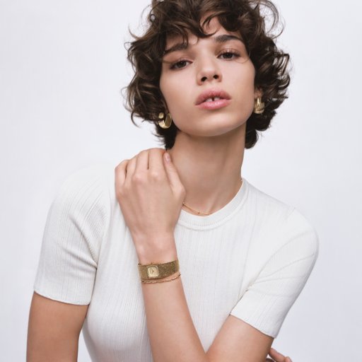 Stålklocka med dekorativ länk