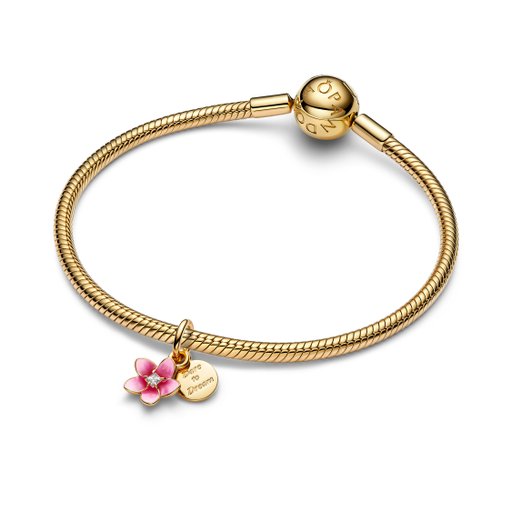 Förgylld berlock med rosa blomma