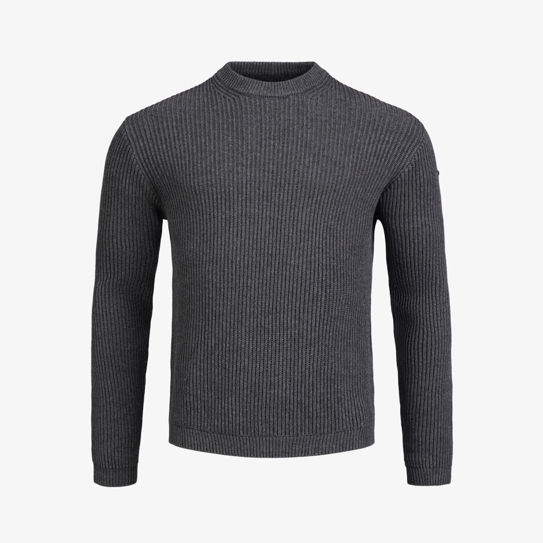 Mons Roundneck LS, Dk Grey Melange Denna rundhalsade stickade tröja är tillverkad i mjuk ekologisk bomull och kashmir, och har en avslappnad passform