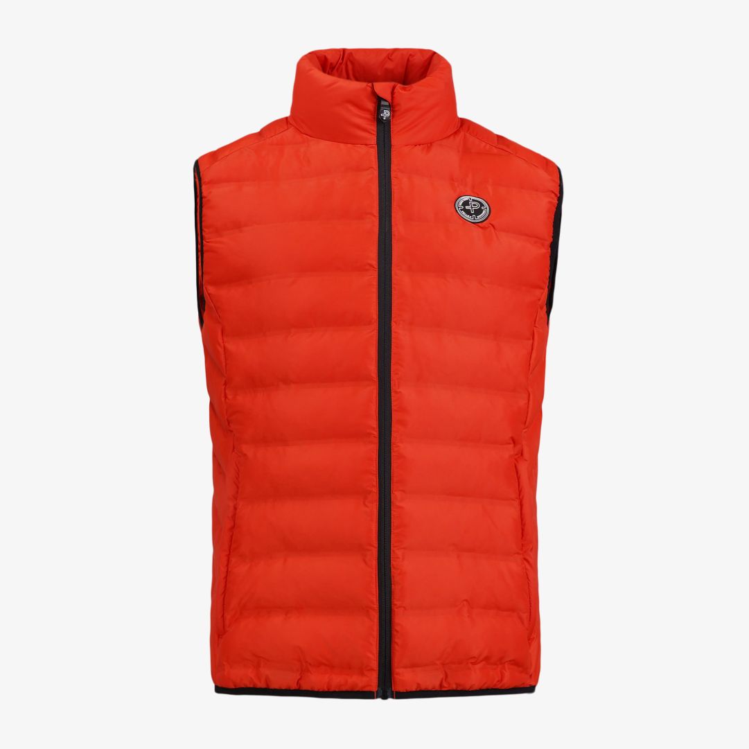 Tempest Vest, Pyrrole Orange Denna vindtäta och värmande dunfria väst är utvecklad för att fungera som ett perfekt alternativ mellan säsongerna då väd